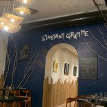 L’instant Gramme Dentro