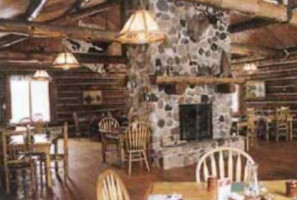 Dining Room In Mecan River Outfitters Lodge inside