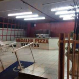 Medalha Pizzas inside