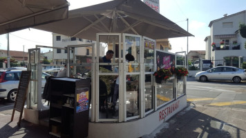 Saint Laurent Cafe outside