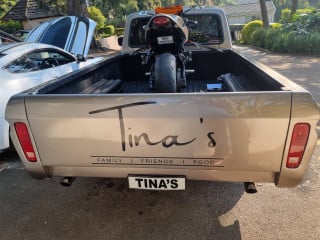 Tina's