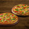 Duas Combinações Clássicas De Pizza Média Vegetariana.