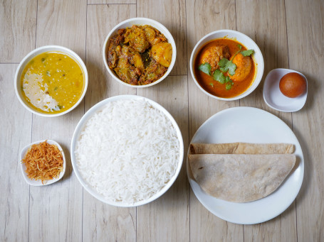 Egg Meal (Rice Roti (2 Pcs) Dal Sabji (Seasonal) Egg Curry (2 Pcs 1 Pc Aloo) Salad Sweet) (Serves 1)