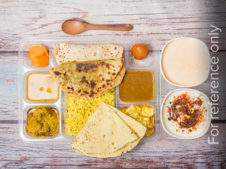 Surbhi Special Thali (Roti (3 Pcs) ,Stuffed Paratha (2 Pcs), 3 Sabji, Rice Pulao ,Dal , Papad, Pickle , Sweet (1 Pcs), Salad , Dahi Vada)