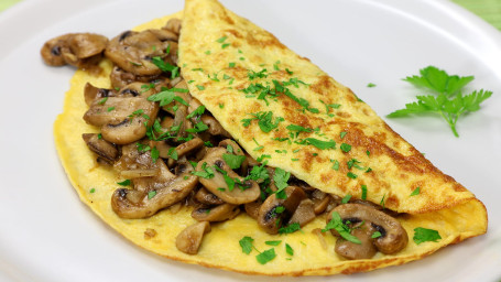 Mushroom Omelette Served With 2 Pcs Toast With Butter And Ketchup