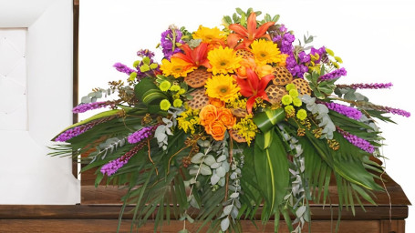 Radiant Medley Casket Spray Funeral Flowers