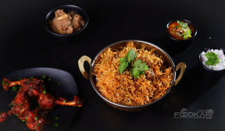 Chicken Biryani, Chicken Lollipop, Raita, Brinjal And Sweet