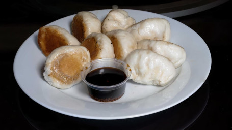 Pan Fried Steamed Pork Buns zhū ròu shuǐ jiān bāo