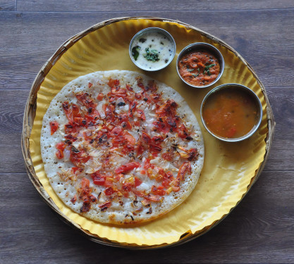 Tomato Uttapam (Served With Chutney And Sambar)
