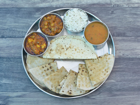 Punjabi Thali (1 Paneer Sabji,1 Dal Fry,1 Jeera Rice,5 Tawa Chapati,1 Papad)