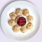 Veggi Pan Fried Momos In Tomao Sauce (8 Pcs)