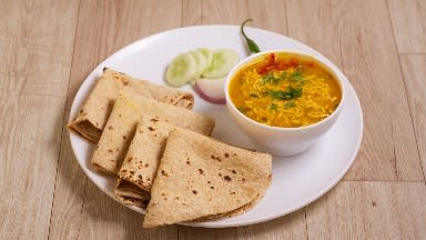 Sev Tamatar, 5 Tawa Butter Roti/ 4 Tawa Butter Paratha, Buttermilk, Salad