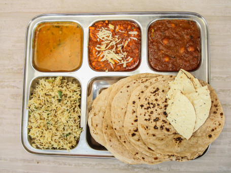 Punjabi Thali (Paneer Sabji Veg Sabji Dal Fry Jeera Rice Papad Chaas Salad 4 Roti.