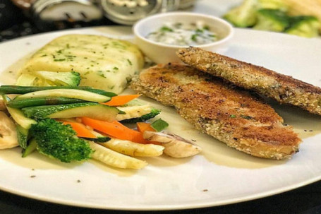 Crispy Pan Seared Fish With Potato Mash And Sauteed Veggies
