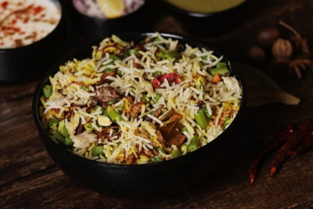 Veg Lucknowi Biryani (Served With Raita , Mint Chutney Gulab Jamun)