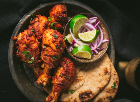 Tandoori Chicken 2 Pcs Butter Chicken 4 Pcs Tikka 5 Tawa Roti