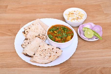 Aloo Mutter With Raita Or 5 Twa Butter Roti Combo