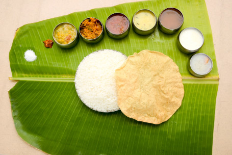 Meals (Rice Sambar Puli Kolambu Rasam Poriyal Kottu Appalam Payasam Curd) 550Gm