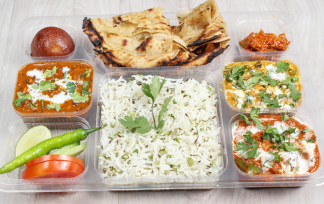 1 Butter Naan,1 Lachcha Paratha, Chawal, Dal, 2 Verities Of Paneer Sabzi, Salad, Rayta, 1Pcs Meetha