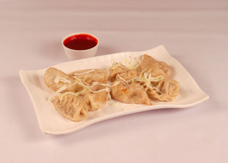 Veg Sweet Chilli Momos 8 Pcs Served With Red Spicy Chutney Mevnies