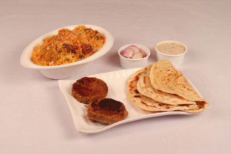 Mutton Galouti Kebab 2 Pcs Paratha 1 Pc Chicken Dum Biryani 2 Pcs Half Raita