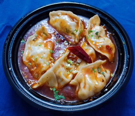 Veggie Dumplings In Hot Garlic Sauce (6 Pieces)