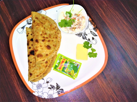Aloo Paratha (2 Pcs) With Curd, Butter And Pickle