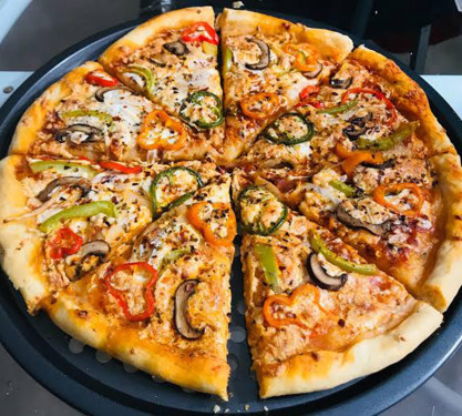 8 Schezwan Panner Pizza