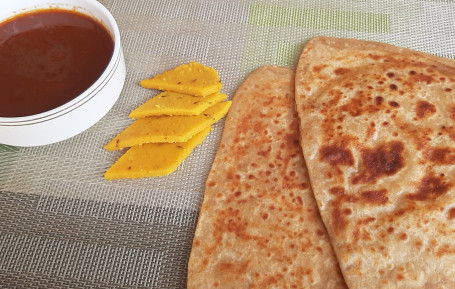 2 Plain Paratha And Patodi Rassa