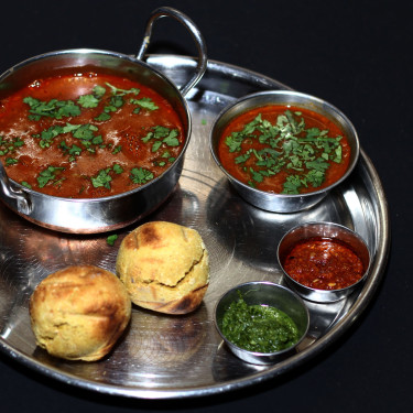 Rajasthani Dal Fry Tadka With Bafla And Laddu