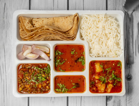 Jalaram Gujarati Thali (Jain Not Available) (2 Veg Sabji 1 Kathol Sabji 6 Butter Roti Dal Rice Or Dal Khichidi 1 Roasted Papad Salad Achar Mukhwas)