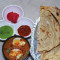 Egg Curry Laccha Paratha Meal .