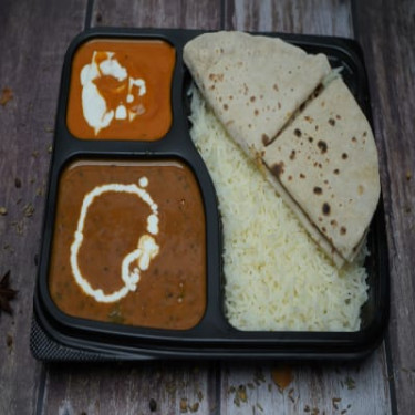 Dal Makhni, Paneer Butter Masala, Tawa Roti (4), Rice, Salad Raita Thali