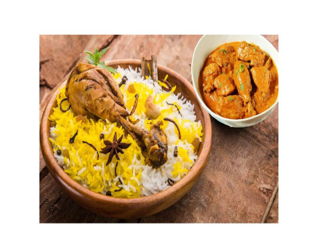 Hyderabadi Chicken Biryani With Leg Piece+ Raita Free Chicken Korma