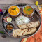 Veg Thali (Cheese Dish Dal Raita Rice 4 Chapatis)