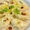 Conchiglione de alho poró com bacon ao molho bechamel