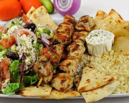 Chicken Kebab With Fries Rice Greek Salad And Pitta Bread