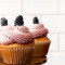 buttermilk cupcake with blackberry buttercream