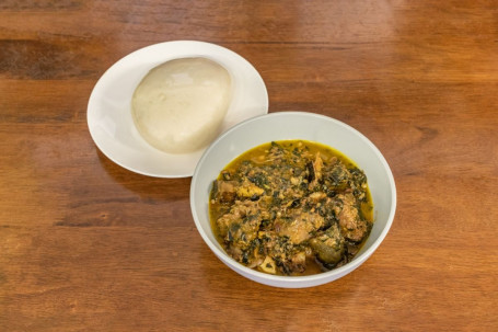 Bitterleaf Soup Served With A Choice Of Pounded Yam, Eba Or Amala