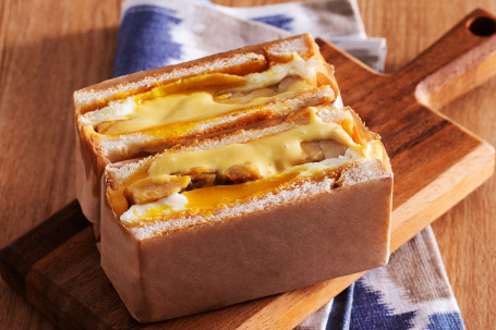 Màn Kǎo Jī Tuǐ Qǐ Sī Dàn Tǔ Sī Slow Grilled Chicken Steak Egg Toast W/ Cheese