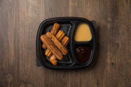 5 Churros With Salted Caramel And Chocolate Sauce