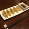 2. Grilled Chicken Dumplings (5) – Je Jī Tiē