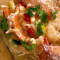 Lobster, Shrimp Creamy White Wine Sauce Over Grit Cake