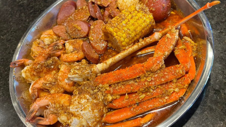 C1. 1/2 Lb Snow Crab Legs, 1/2 Lb Shrimp (No Head), 1/2 Lb All-Meat Sausage, 1 Boiled Egg, 1 Corn 1 Potato