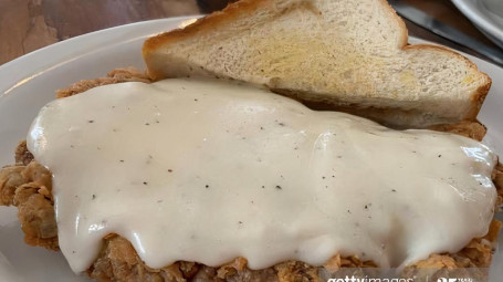 9. Country Fried Steak With Hash Or Grits, 3 Eggs Toast