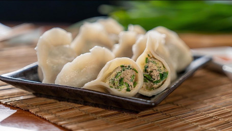 Pork Dumplings With Green Chive Jiǔ Cài Zhū Ròu Shuǐ Jiǎo