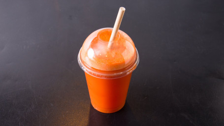 Fresh Carrot Orange Booster Served In Bottle