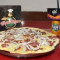 Pizza Calabresa Fanta laranja 350ml brinde