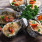 ½ Dozen Oysters, Baked With Butter, Cream, Garlic, Spinach And Sundried Tomato