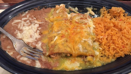 4. 2 Chicken Enchiladas, Topped With Sour Cream, And 1 Beef Taco